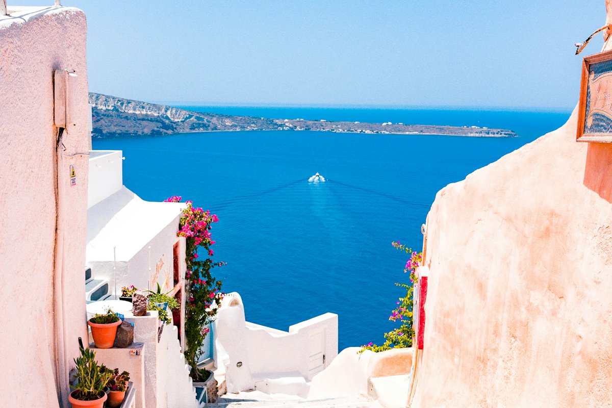 White buildings above a blue coast